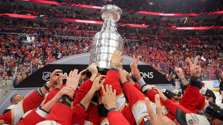 Jun 17, 2025; Sunrise, Florida, USA; The Florida Panthers hoist the Stanley Cup after winning game six of the 2025 Stanley Cup Final against the Edmonton Oilers at Amerant Bank Arena. Mandatory Credit: Sam Navarro-Imagn Images Jun 17, 2025; Sunrise, Florida, USA; The Florida Panthers hoist the Stanley Cup after winning game six of the 2025 Stanley Cup Final against the Edmonton Oilers at Amerant Bank Arena. Mandatory Credit: Sam Navarro-Imagn Images