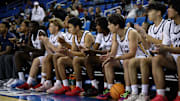Crean Lutheran players look on as the Saints take on Campbell Hall at Pauley Pavilion.