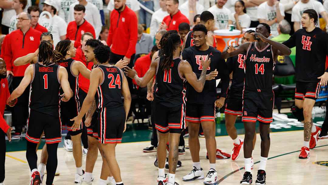 Jan 10, 2026; Waco, Texas, USA; The Houston Cougars bench reacts after a play against the Baylor Bears during the first half at Paul and Alejandra Foster Pavilion. Mandatory Credit: Chris Jones-Imagn Images