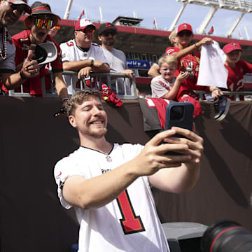 Oct 22, 2023; Tampa, Florida, USA;  YouTuber Jimmy Donaldson MrBeast takes photos with fans before a game between the Atlanta Falcons and Tampa Bay Buccaneers at Raymond James Stadium. Mandatory Credit: Nathan Ray Seebeck-Imagn Images