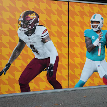 A graphic with images of Washington Commanders linebacker Frankie Luvu (4) and Miami Dolphins quarterback Tua Tagovailoa (1) at Santiago Bernabeu Stadium, the site of the 2025 NFL Madrid Game.