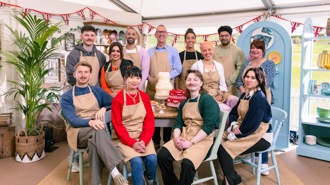The Great British Bake Off. Back: Toby, Nadia, Aaron, Leighton, Jessika, Jasmine, Hassan, Lesley, Front: Tom, Pui Man, Iain, Nataliia Sitting in Cake Corner The Great British Bake Off. Back: Toby, Nadia, Aaron, Leighton, Jessika, Jasmine, Hassan, Lesley, Front: Tom, Pui Man, Iain, Nataliia Sitting in Cake Corner