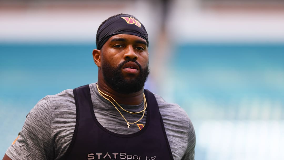 Aug 17, 2024; Miami Gardens, Florida, USA; Washington Commanders defensive tackle Jonathan Allen (93) warms up before a preseason game against the Miami Dolphins at Hard Rock Stadium. Mandatory Credit: Sam Navarro-Imagn Images