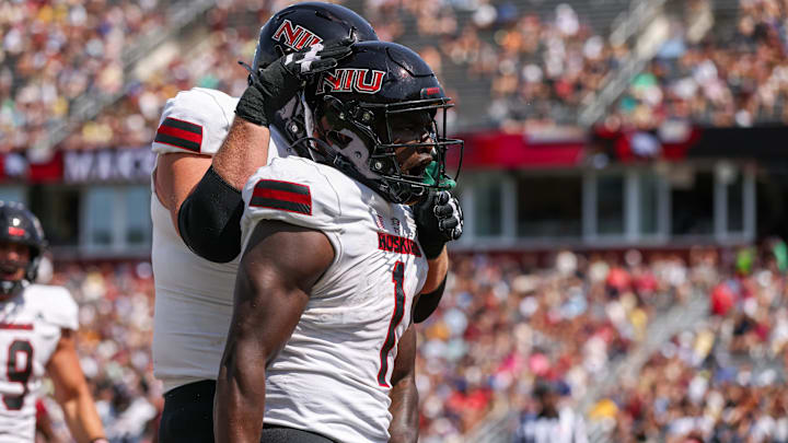 Sep 2, 2023; Chestnut Hill, Massachusetts, USA; Northern Illinois Huskies running back Antario Brown (1) reacts after scoring a touchdown during the first half against the Boston College Eagles at Alumni Stadium. 