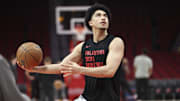 Mar 17, 2025; Houston, Texas, USA; Philadelphia 76ers guard Jared McCain (20) warms up before the game against the Houston Rockets at Toyota Center. Mandatory Credit: Troy Taormina-Imagn Images