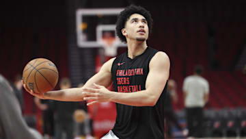 Mar 17, 2025; Houston, Texas, USA; Philadelphia 76ers guard Jared McCain (20) warms up before the game against the Houston Rockets at Toyota Center. Mandatory Credit: Troy Taormina-Imagn Images