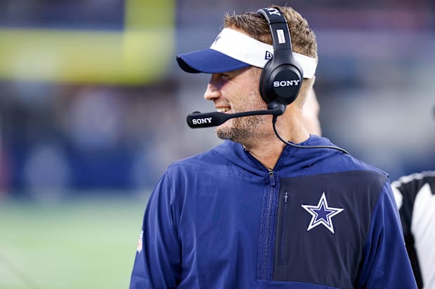 Dallas Cowboys head coach Brian Schottenheimer smiles during the first quarter against the Atlanta Falcons. 