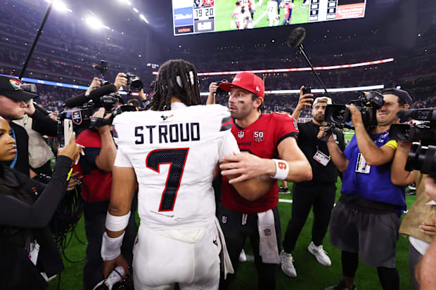 Tampa Bay Buccaneers quarterback Baker Mayfield (6) and Houston Texans QB C.J. Stroud talk after their game on Monday.