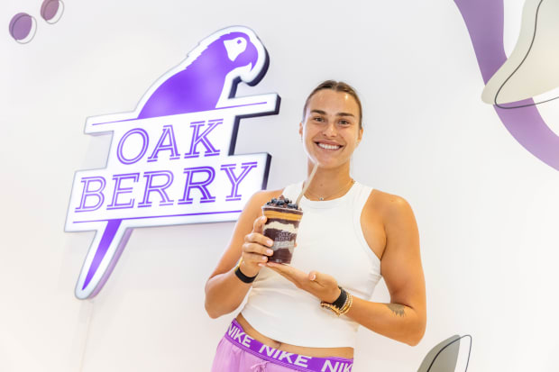 Aryna Sabalenka holds OAKBERRY.