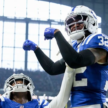 Indianapolis Colts safety Julian Blackmon (32) celebrates with Indianapolis Colts cornerback Jaylon Jones (40) and Jones’ interception Sunday, Sept. 22, 2024, during a game against the Chicago Bears at Lucas Oil Stadium in Indianapolis.