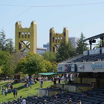 Apr 9, 2025; West Sacramento, California, USA; A general view of the first base stands and Tower bridge before the game between the Athletics and the San Diego Padres at Sutter Health Park. Mandatory Credit: Darren Yamashita-Imagn Images