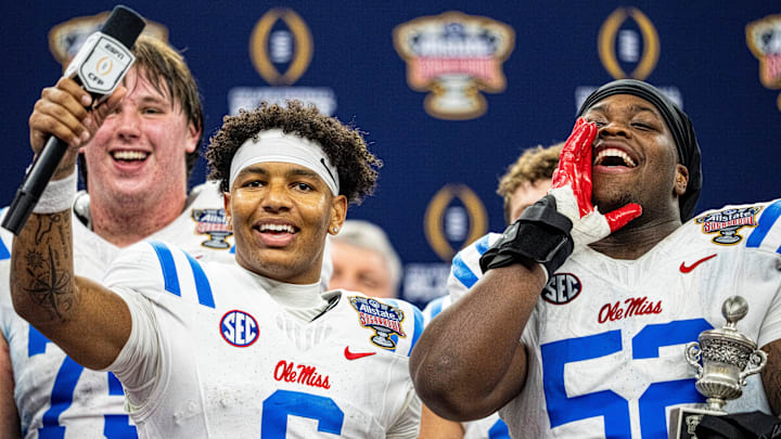 Ole Miss quarterback Trinidad Chambliss (6) and defensive lineman Will Echoles (52) interact with the fans after the Sugar Bowl and College Football Playoff quarterfinals.