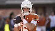 Nov 22, 2025; Austin, Texas, USA; Texas Longhorns quarterback Arch Manning (16) warms up before a game against the Arkansas Razorbacks at Darrell K Royal-Texas Memorial Stadium. Mandatory Credit: Scott Wachter-Imagn Images