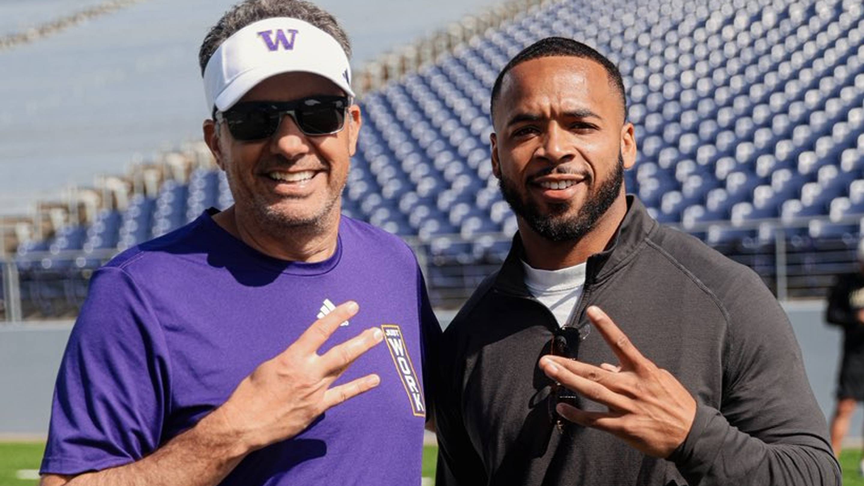 Jedd Fisch and Myles Gaskin share a Montlake moment.