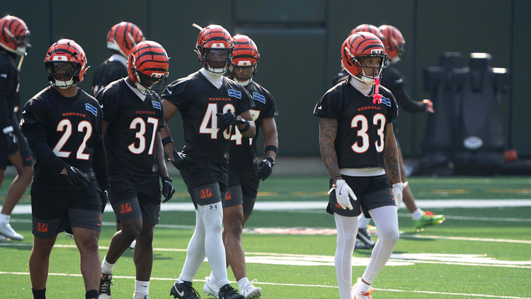 Cincinnati Bengals safety Geno Stone (22), Cincinnati Bengals safety PJ Jules (37), Cincinnati Bengals safety Jaylen Key (43) and Cincinnati Bengals safety Daijahn Anthony (33) walk together at Bengals Mini Camp inside Paycor Stadium in Cincinnati on Thursday, June 12, 2025.