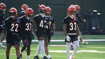 Cincinnati Bengals safety Geno Stone (22), Cincinnati Bengals safety PJ Jules (37), Cincinnati Bengals safety Jaylen Key (43) and Cincinnati Bengals safety Daijahn Anthony (33) walk together at Bengals Mini Camp inside Paycor Stadium in Cincinnati on Thursday, June 12, 2025.