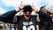 Oct 11, 2025; Boulder, Colorado, USA; Colorado Buffaloes fans cheer in the second half against the Iowa State Cyclones at Folsom Field. Mandatory Credit: Ron Chenoy-Imagn Images