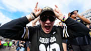 Oct 11, 2025; Boulder, Colorado, USA; Colorado Buffaloes fans cheer in the second half against the Iowa State Cyclones at Folsom Field. Mandatory Credit: Ron Chenoy-Imagn Images