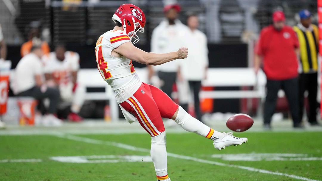 Jan 4, 2026; Paradise, Nevada, USA; Kansas City Chiefs punter Matt Araiza (14) punts the ball against the Las Vegas Raiders in the first half at Allegiant Stadium. Mandatory Credit: Kirby Lee-Imagn Images