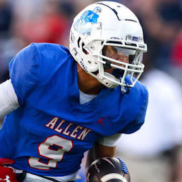 Allen junior Brett Holloway (9) evades Cedar Hill's Carlos Porter in a 42-14 Allen win on Friday, Sept. 6, 2024. Holloway has transferred to Melissa for his senior season. 