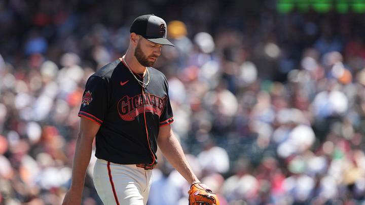 May 23, 2026; San Francisco, California, USA; San Francisco Giants starting pitcher Adrian Houser (12) walks to the dugout after being removed from the game against the Chicago White Sox during the fifth inning at Oracle Park. Mandatory Credit: Darren Yamashita-Imagn Images
