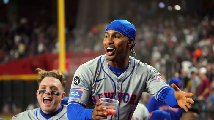 Aug 28, 2024; Phoenix, Arizona, USA; New York Mets shortstop Francisco Lindor (12) and New York Mets outfielder Harrison Bader (44) celebrate against the Arizona Diamondbacks during the sixth inning at Chase Field. Mandatory Credit: Joe Camporeale-USA TODAY Sports