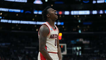 Mar 28, 2024; Los Angeles, CA, USA; Arizona Wildcats guard Jaden Bradley (0) reacts in the first half against the Clemson Tigers in the semifinals of the West Regional of the 2024 NCAA Tournament at Crypto.com Arena. Mandatory Credit: Kirby Lee-Imagn Images