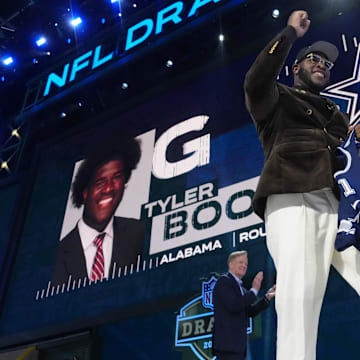 Tyler Booker is selected by the Dallas Cowboys as the number twelve pick in the first round of the 2025 NFL Draft at Lambeau Field.