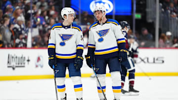 Mar 29, 2025; Denver, Colorado, USA; St. Louis Blues center Radek Faksa (12) and center Dalibor Dvorsky (54) before the game against the Colorado Avalanche at Ball Arena. Mandatory Credit: Ron Chenoy-Imagn Images