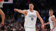 Denver Nuggets center Jokic points in the second half against the Phoenix Suns at Ball Arena. 