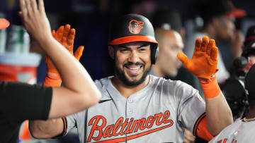 Aug 7, 2024; Toronto, Ontario, CAN; Baltimore Orioles right fielder Anthony Santander (25) celebrates in the dugout after hitting a home run against the Toronto Blue Jays during the eighth inning at Rogers Centre.