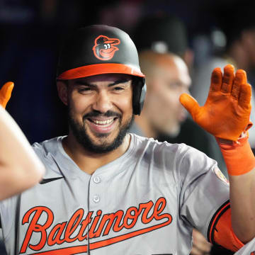 Baltimore Orioles right fielder Anthony Santander (25) celebrates in the dugout after hitting a home run against the Toronto Blue Jays during the eighth inning at Rogers Centre on Aug 7.