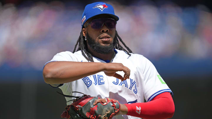 Jun 15, 2024; Toronto, Ontario, CAN; Toronto Blue Jays first baseman Vladimir Guerrero Jr. (27) walks towards the dugout against the Cleveland Guardians during the first inning at Rogers Centre.
