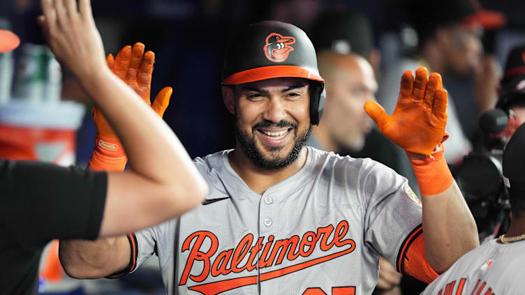 Aug 7, 2024; Toronto, Ontario, CAN; Baltimore Orioles right fielder Anthony Santander (25) celebrates in the dugout after hitting a home run against the Toronto Blue Jays during the eighth inning at Rogers Centre. Mandatory Credit: Nick Turchiaro-USA TODAY Sports