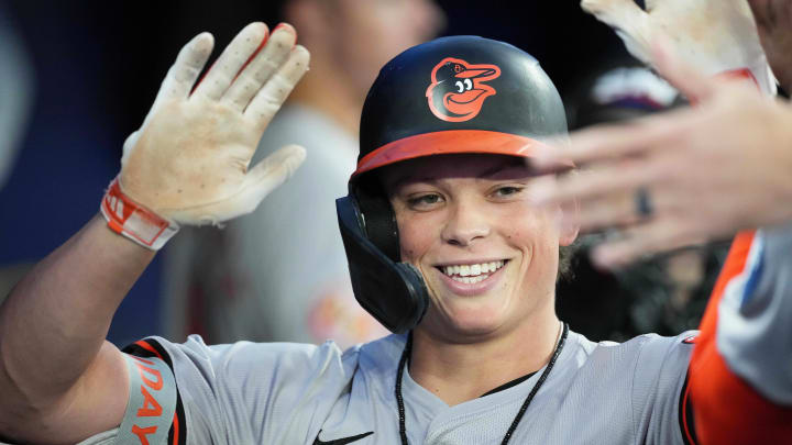 Aug 6, 2024; Toronto, Ontario, CAN; Baltimore Orioles second baseman Jackson Holliday (7) celebrates in the dugout after hitting a home run against the Toronto Blue Jays during the sixth inning at Rogers Centre. Mandatory Credit: Nick Turchiaro-USA TODAY Sports