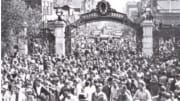 Crowd greets Cal's gold-medal varsity eight rowers in Berkeley in 1928
