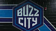 Feb 25, 2023; Charlotte, North Carolina, USA; General view of Charlotte Hornets logo at Spectrum Center. Mandatory Credit: David Yeazell-Imagn Images
