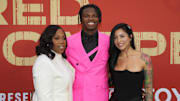 Colorado Buffaloes wide receiver Travis Hunter with his mother Ferrante Harris and his fiancee Leanna Lenee at the NFL Draft. 