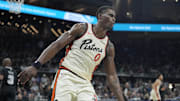 Feb 21, 2025; Austin, Texas, USA; Detroit Pistons center Jalen Duren (0) reacts after dunking during the second half against the San Antonio Spurs at Moody Center. Mandatory Credit: Scott Wachter-Imagn Images