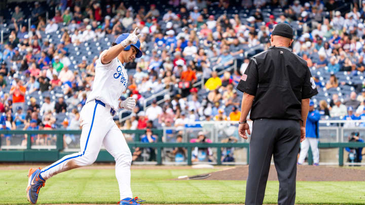 Jun 19, 2024; Omaha, NE, USA; Florida Gators first baseman Jac Caglianone (14) celebrates after hitting a home run against the Kentucky Wildcats during the sixth inning at Charles Schwab Field Omaha. The 75th home run of his career, Caglianone breaks the Florida all-time home run record previously held by Matt LaPorta. Mandatory Credit: Dylan Widger-USA TODAY Sports