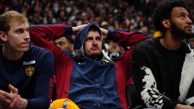 Denver Nuggets center Nikola Jokic on the bench