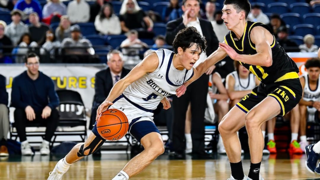 Brogan Howell, left, sank the game-winning shot with two seconds remaining to win the Class 4A boys basketball championship for Gonzaga Prep.