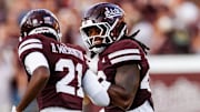Mississippi State Linebacker Nic Mitchell (#40) and Mississippi State Safety Hunter Washington (#21) during the game between the Alcorn State Braves and the Mississippi State Bulldogs at Davis Wade Stadium at Scott Field in Starkville, MS.