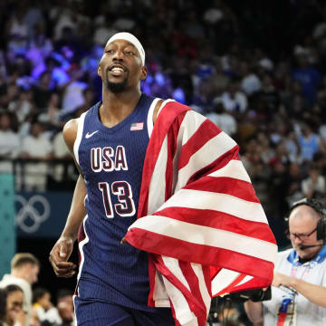 Aug 10, 2024; Paris, France; United States centre Bam Adebayo (13) celebrates after defeating France in the men's basketball gold medal game during the Paris 2024 Olympic Summer Games at Accor Arena. Mandatory Credit: Rob Schumacher-USA TODAY Sports