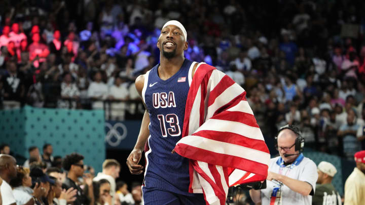 Aug 10, 2024; Paris, France; United States centre Bam Adebayo (13) celebrates after defeating France in the men's basketball gold medal game during the Paris 2024 Olympic Summer Games at Accor Arena. Mandatory Credit: Rob Schumacher-USA TODAY Sports