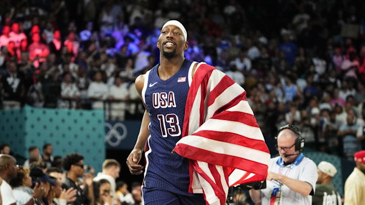 Aug 10, 2024; Paris, France; United States centre Bam Adebayo (13) celebrates after defeating France in the men's basketball gold medal game during the Paris 2024 Olympic Summer Games at Accor Arena. Mandatory Credit: Rob Schumacher-Imagn Images