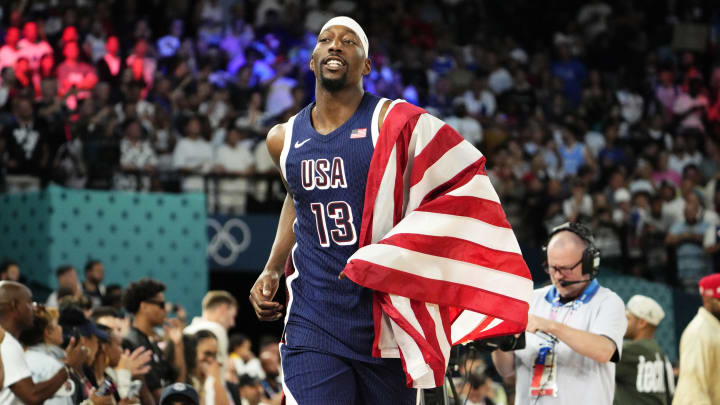 Aug 10, 2024; Paris, France; United States centre Bam Adebayo (13) celebrates after defeating France in the men's basketball gold medal game during the Paris 2024 Olympic Summer Games at Accor Arena. Mandatory Credit: Rob Schumacher-USA TODAY Sports