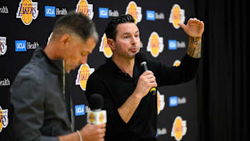 Sep 25, 2025; El Segundo, CA, USA; Los Angeles Lakers head coach JJ Redick, right, speaks during a press conference to preview the 2025-26 season at UCLA Health Training Center. Mandatory Credit: William Liang-Imagn Images