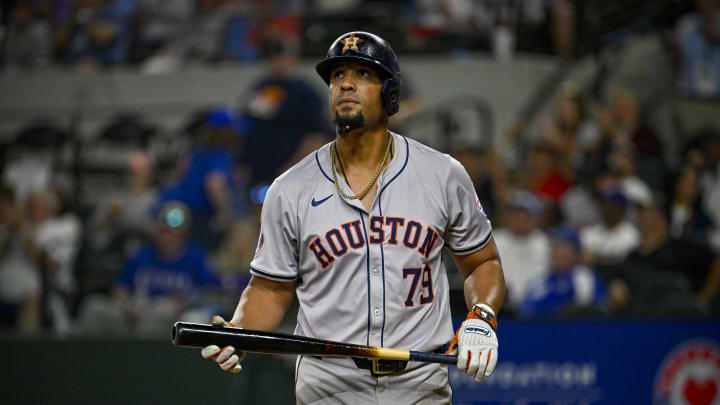 Apr 5, 2024; Arlington, Texas, USA; Houston Astros first base Jose Abreu (79) reacts to striking out.