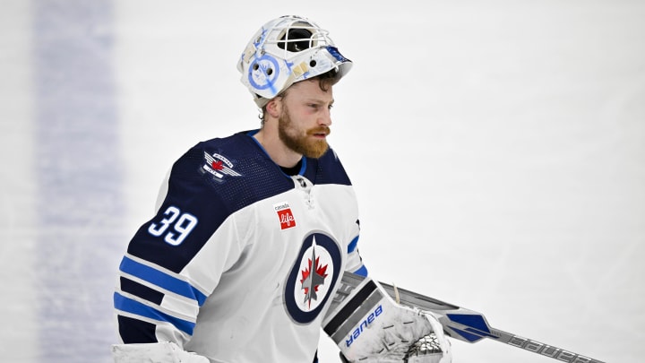 Apr 11, 2024; Dallas, Texas, USA; Winnipeg Jets goaltender Laurent Brossoit (39) skates back up the ice during the second period against the Dallas Stars at the American Airlines Center. Mandatory Credit: Jerome Miron-USA TODAY Sports